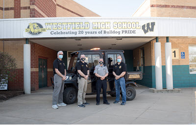 security team in front of the school