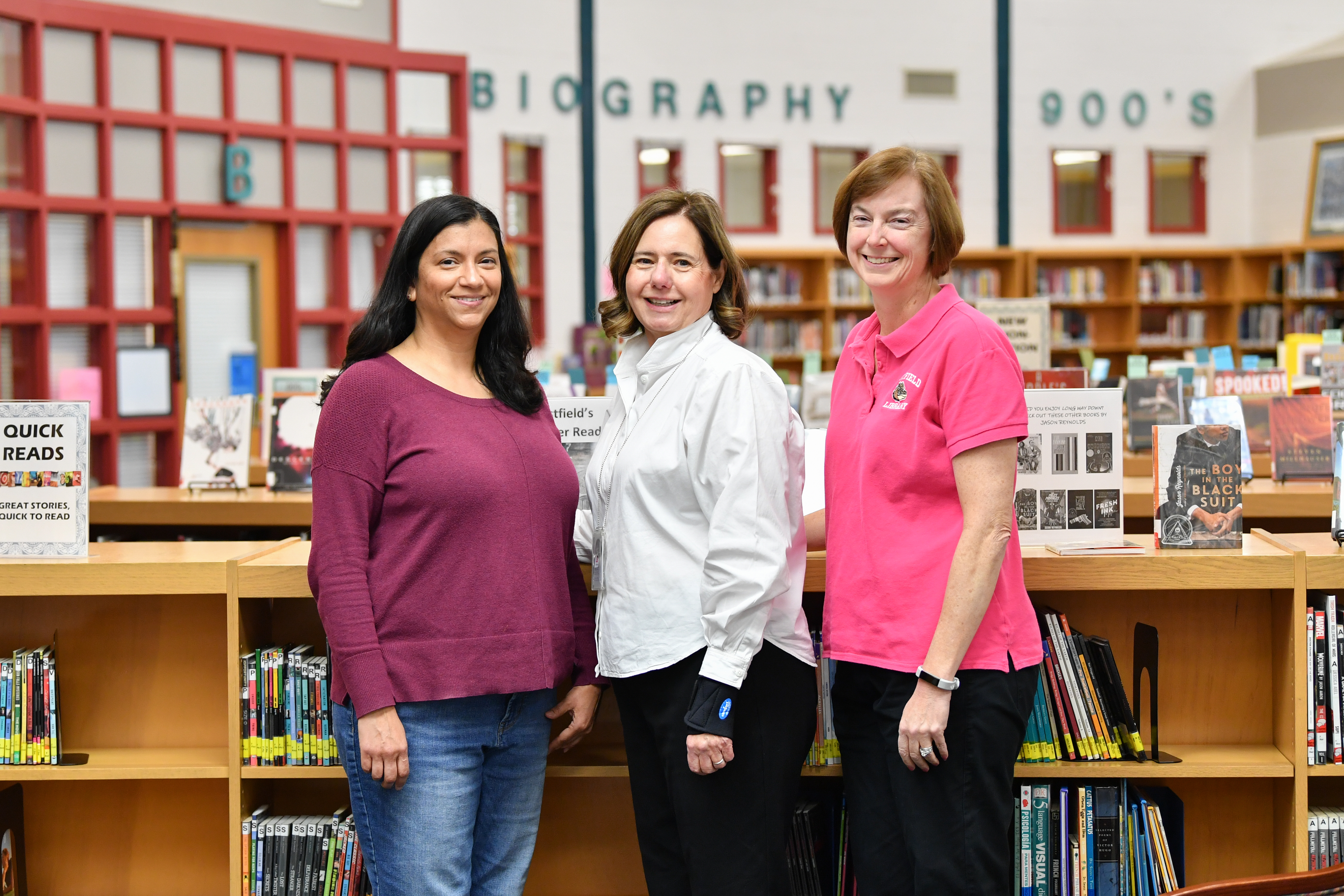Library Staff pose for a photo 